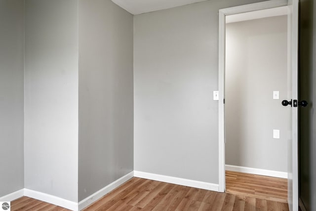 unfurnished room with light hardwood / wood-style floors