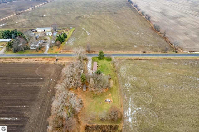 birds eye view of property featuring a rural view