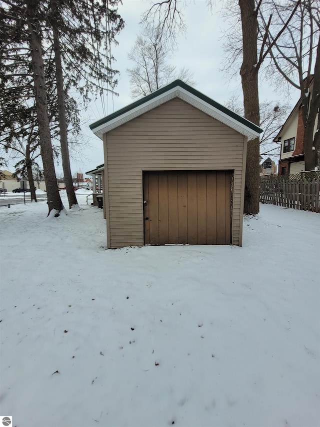 view of snow covered garage