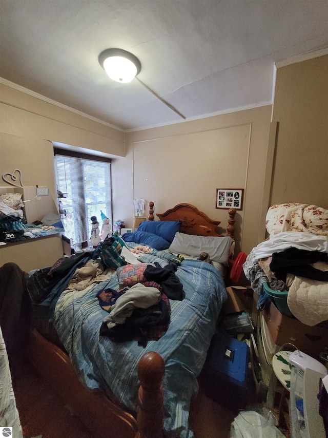 bedroom with ornamental molding