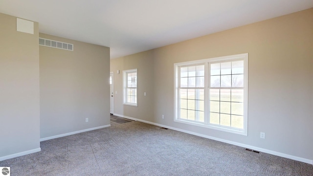 view of carpeted spare room