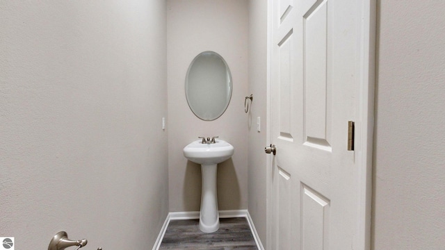 bathroom featuring hardwood / wood-style flooring