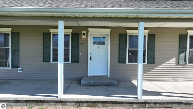 entrance to property with a porch