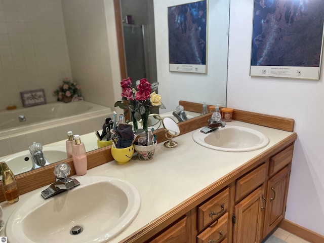 bathroom featuring tile patterned floors and vanity