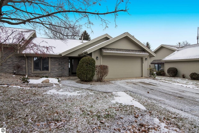 single story home with a garage