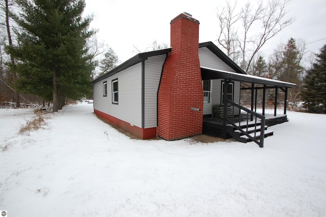 view of snow covered property