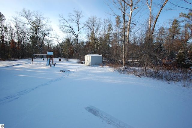 view of yard covered in snow