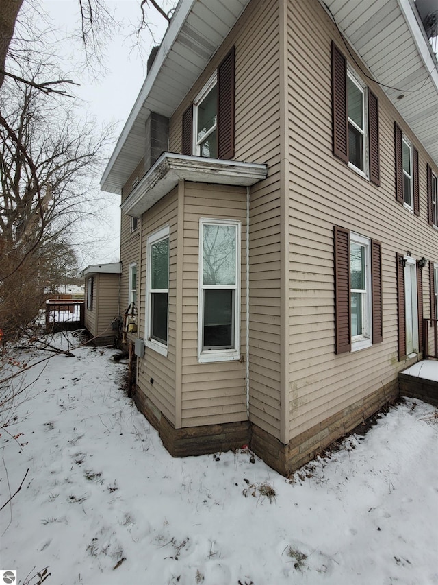 view of snow covered property