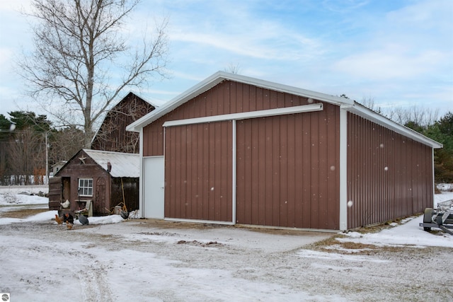 view of snow covered garage