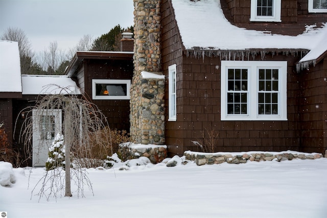 view of snow covered property