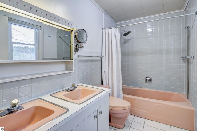 full bathroom featuring toilet, tile patterned flooring, tile walls, backsplash, and shower / bath combo with shower curtain