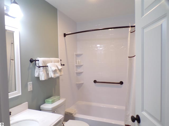 full bathroom featuring vanity, toilet, and shower / tub combo