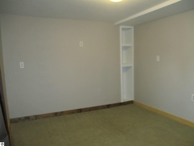 unfurnished room with carpet floors