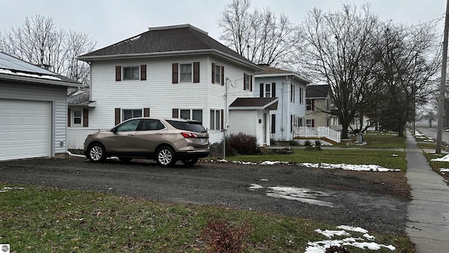 view of front of property with a garage