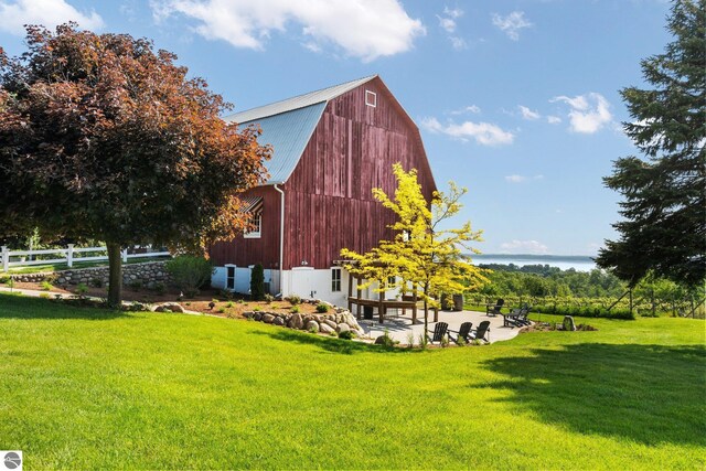 10343 E Hilltop Rd, Suttons Bay, MI 49682 - view of yard featuring an outbuilding