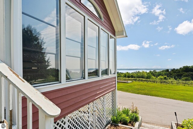 10343 E Hilltop Rd, Suttons Bay, MI 49682 - view of property exterior with a water view