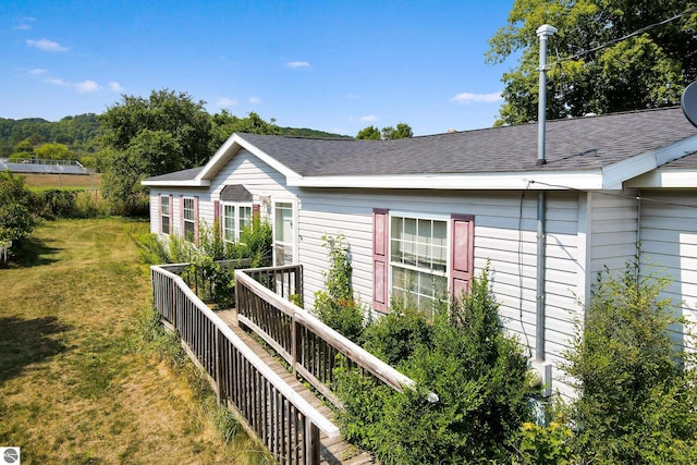 exterior space featuring a front yard