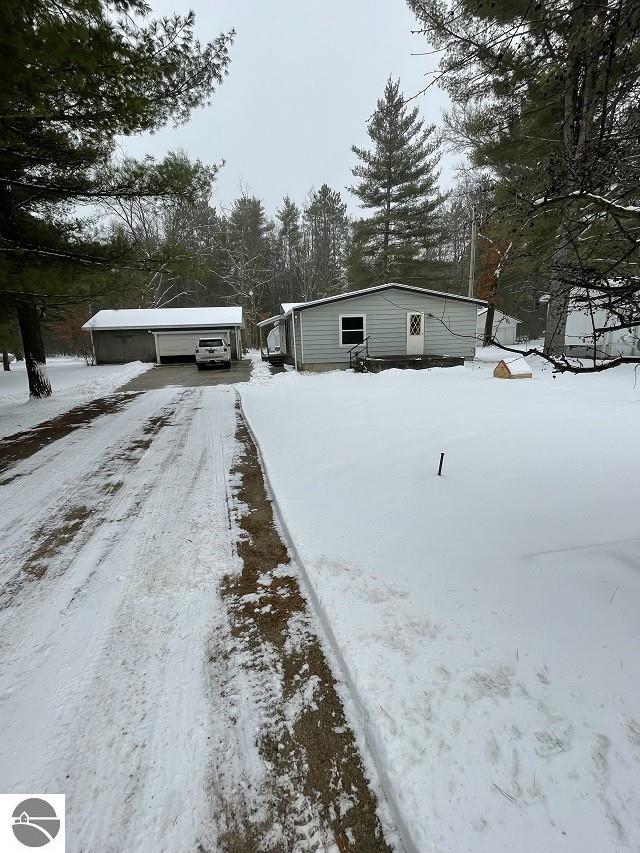 view of snow covered property