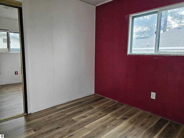 spare room featuring hardwood / wood-style flooring