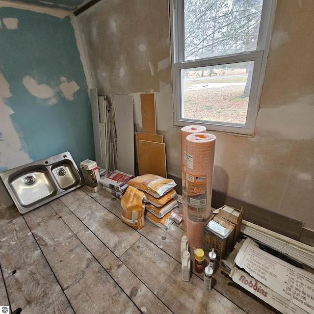 miscellaneous room with hardwood / wood-style floors