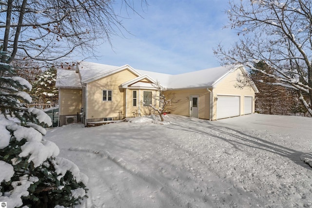 single story home with a garage