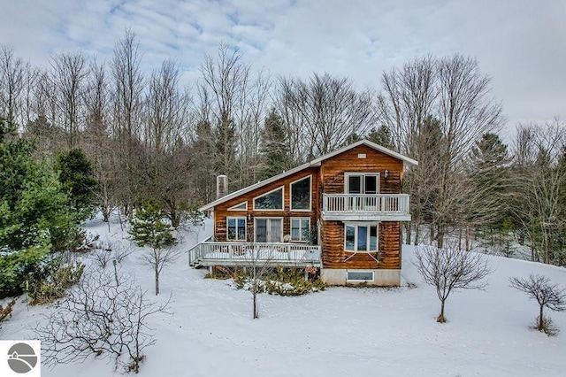 view of snow covered house