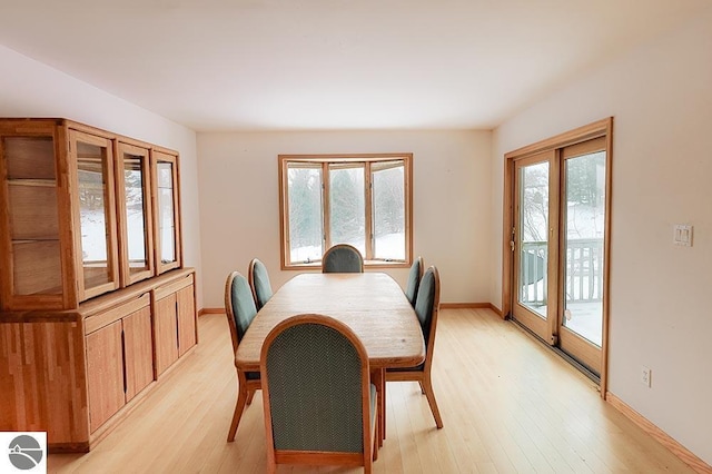 dining area with light wood-type flooring