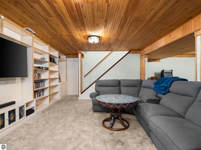 carpeted living room with wooden ceiling