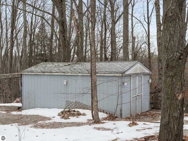 view of snow covered garage