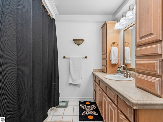 bathroom with tile patterned flooring, vanity, and ornamental molding