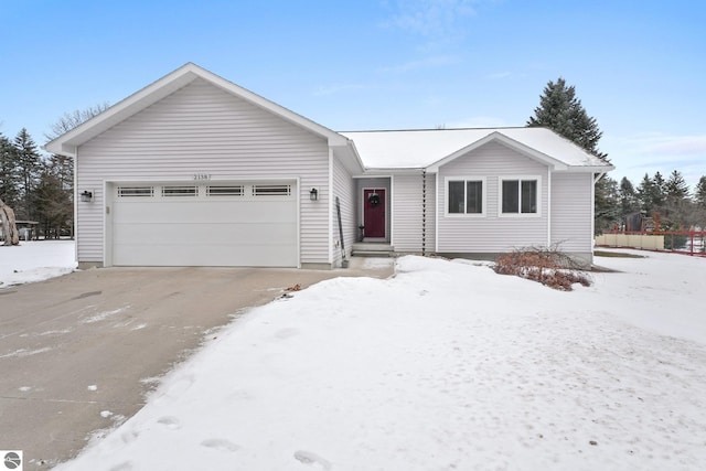 ranch-style home featuring a garage