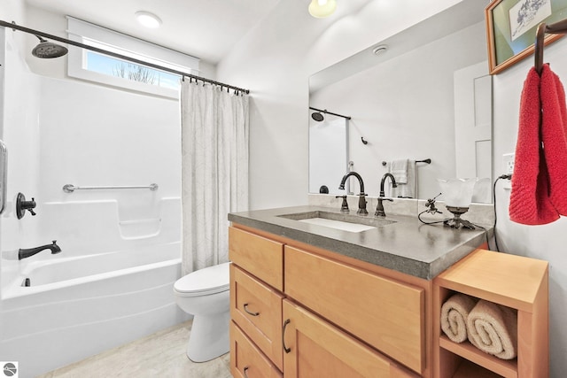 full bathroom featuring shower / tub combo, vanity, and toilet