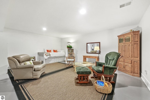 bedroom with concrete flooring