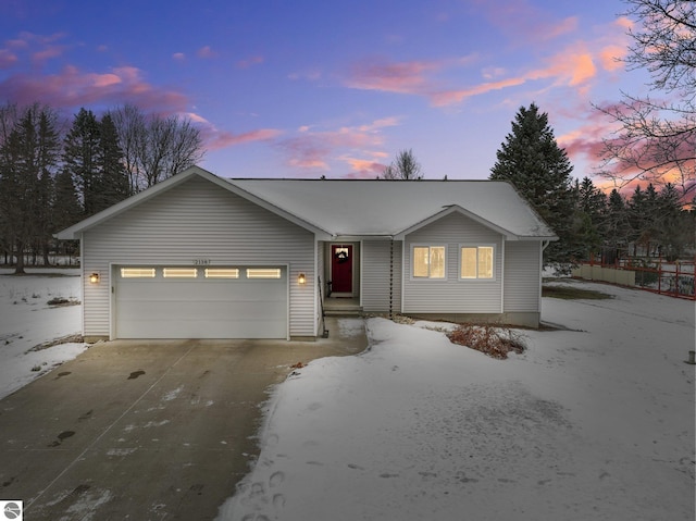 single story home featuring a garage