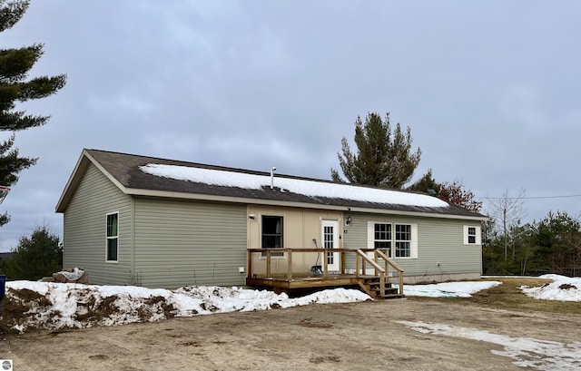 view of front of house featuring a wooden deck