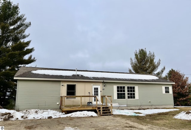 view of front of home with a wooden deck