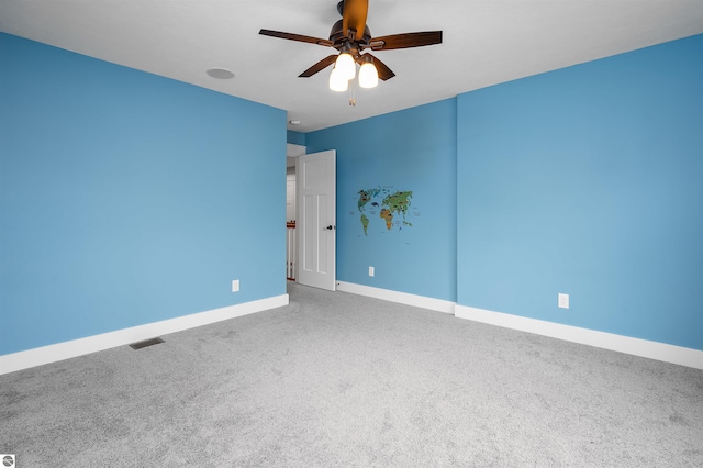 carpeted empty room with ceiling fan