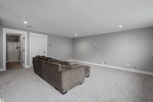 living room featuring light colored carpet