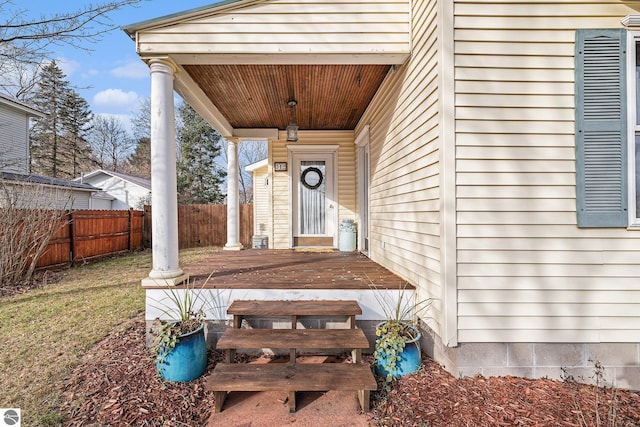 view of exterior entry featuring a porch