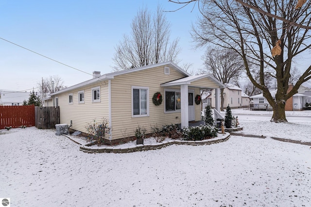 view of snow covered property