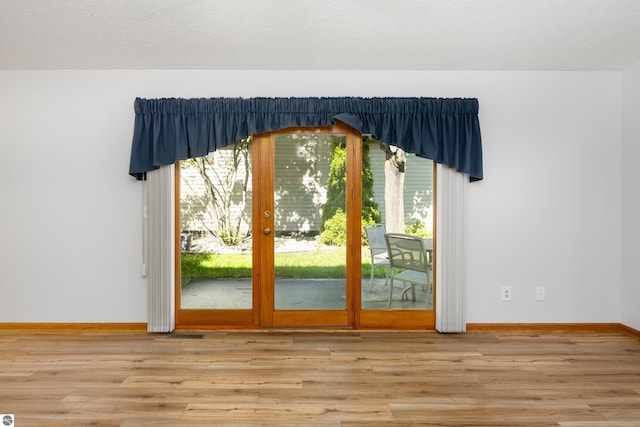 doorway featuring light hardwood / wood-style flooring