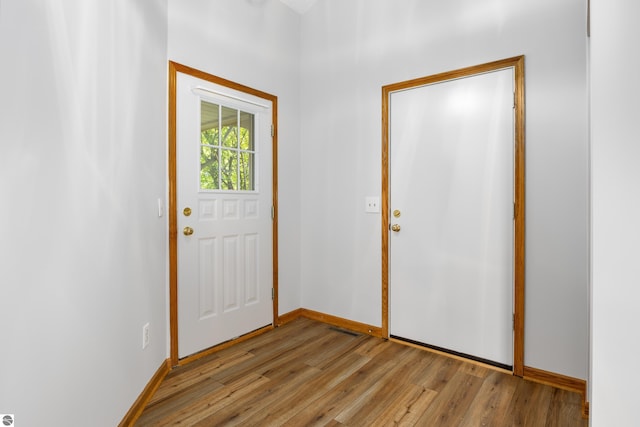 entryway with light hardwood / wood-style floors