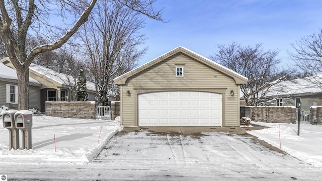 view of snow covered garage