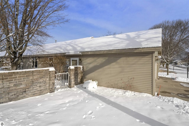 view of snow covered property