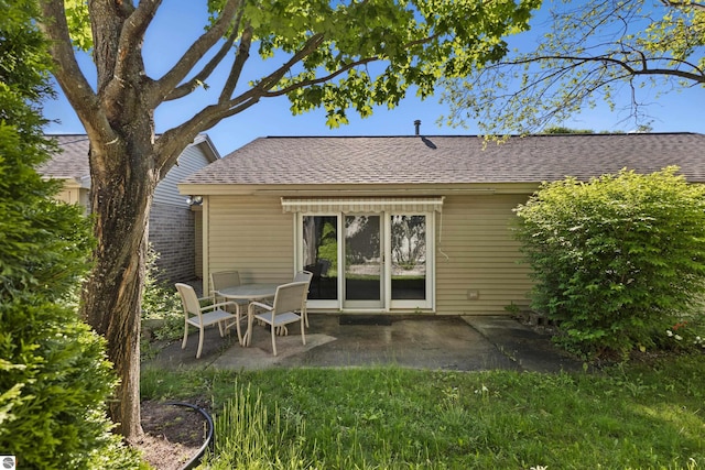 back of property with a patio area