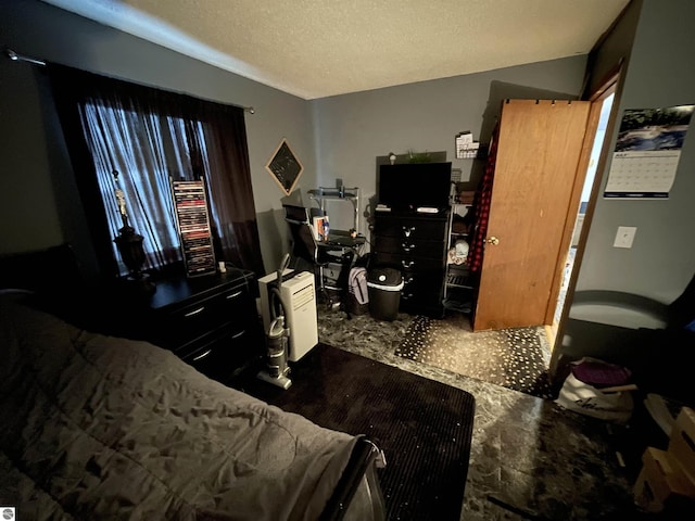 bedroom with a textured ceiling