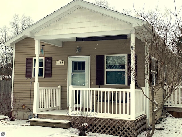 view of front of home featuring covered porch