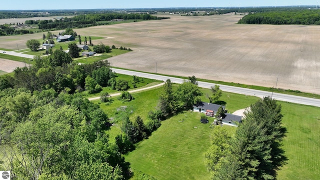 birds eye view of property featuring a rural view