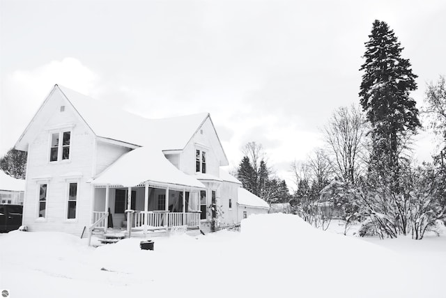 view of snow covered property