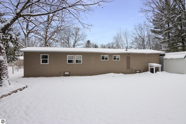 view of snow covered property